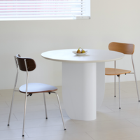 SILHOUETTE ROUND TABLE